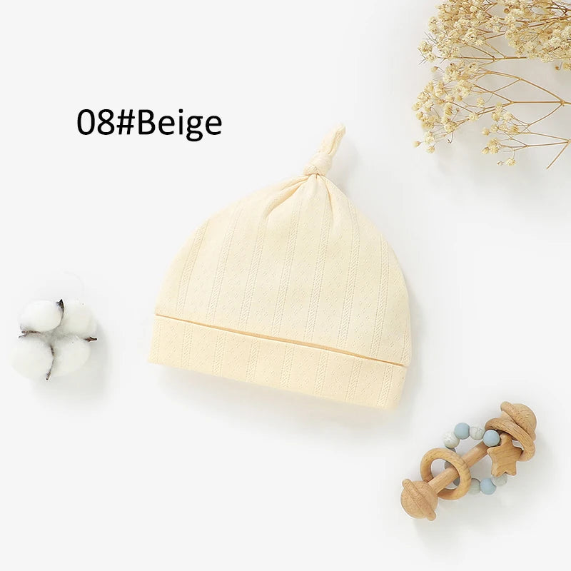 Bonnet pointelle en coton biologique — Beige