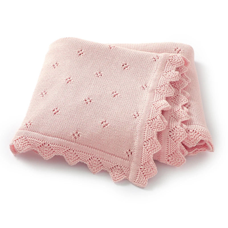 Couverture tricotée à bordure festonnée — Rose aurore