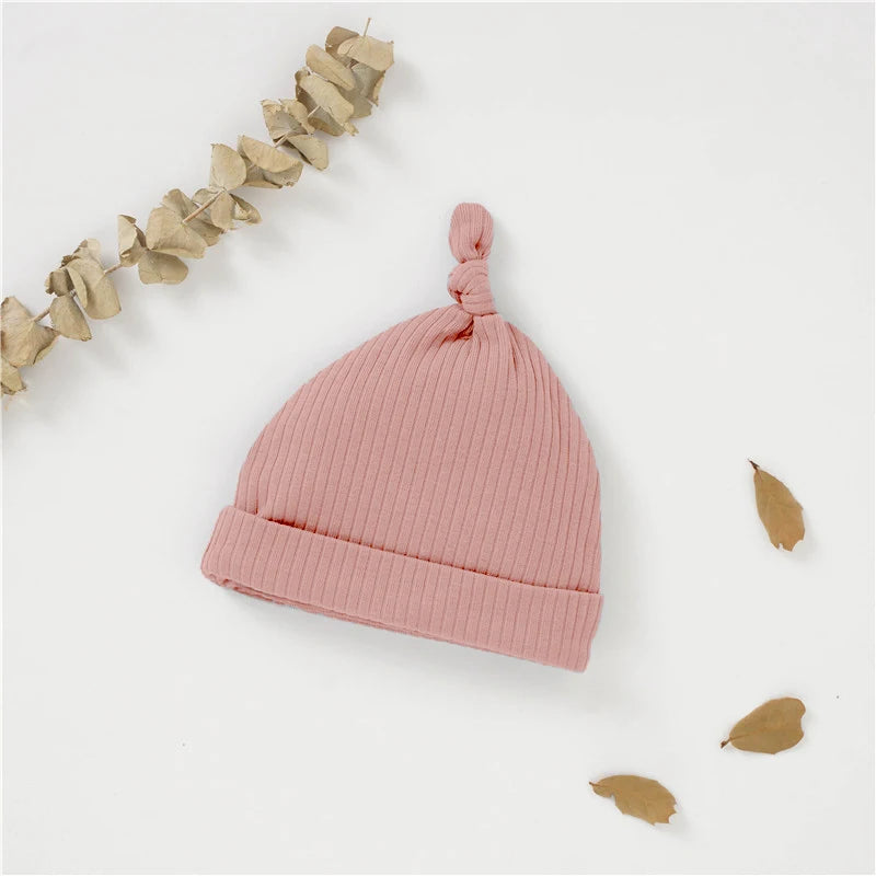 Bonnet noué en coton biologique extensible — Rose poudré (30#)